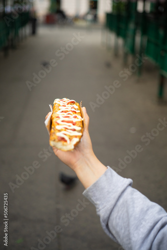 Delicious open-face grilled cheese sandwich made of cheese and baguette. Homemade fast food.