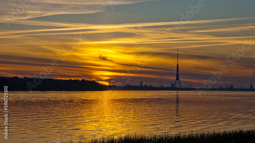 sunset on the river, in the photo the Daugava river in the evening © fotofotofoto