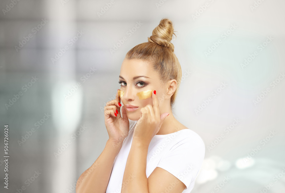 Magic anti-aging cream.Applying the cream Magic anti-aging cream.Applying the cream