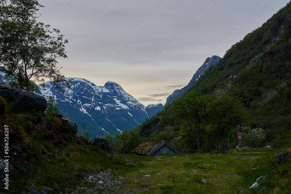 Briksdalasbreen glacier. Sunset. Glacier waterfall. Sheep. Authentic Norwegian house. Spring in Norway. Jostedalsbreen National Park. Oyster catcher.