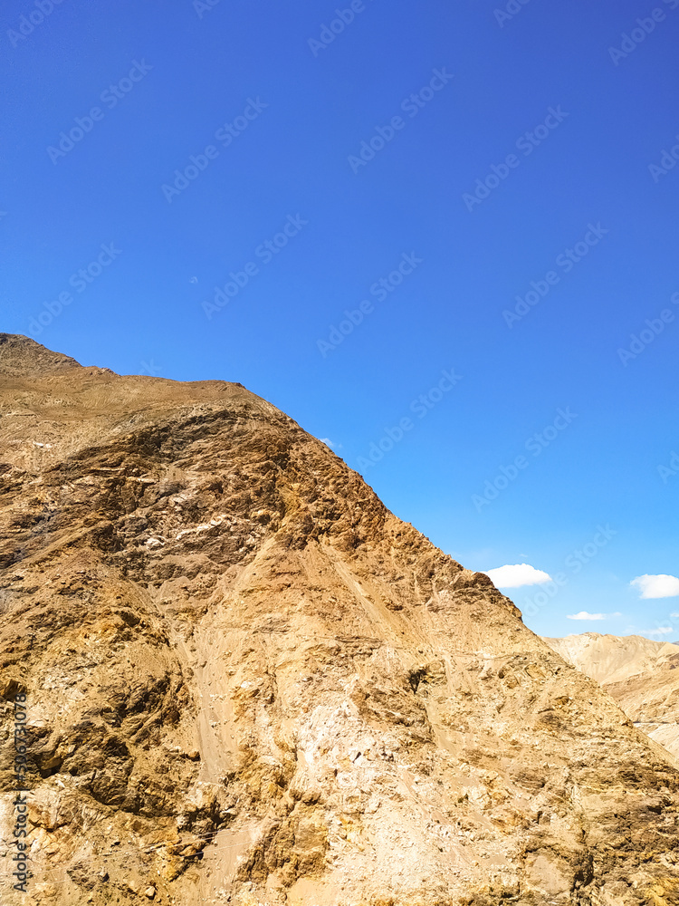 Beautiful mountain landscape with blue sky and clouds