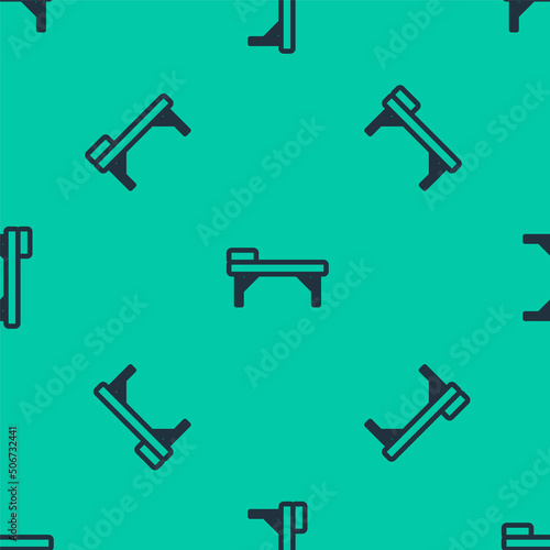 Blue line Massage table icon isolated seamless pattern on green background. Vector