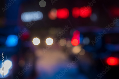multi-colored bokeh from the light of car headlights in the night city © serhii