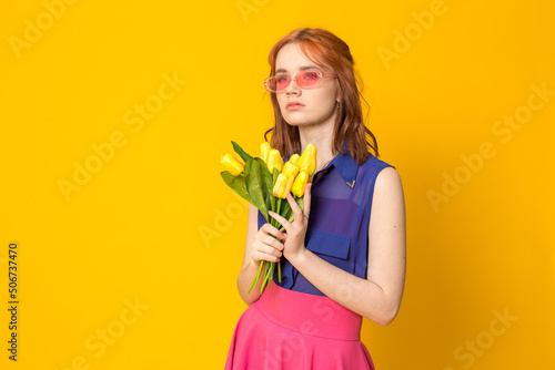 woman with yellow flowers