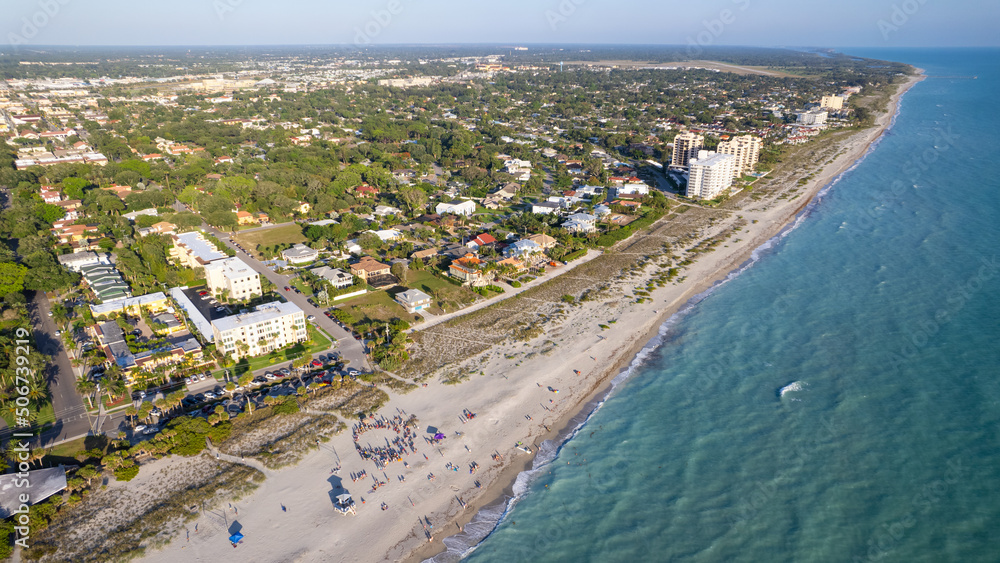Venice beach Florida near Sarasota and Fort Myers. Panorama of Florida city. Flying on drone over Venice beach FL. Gulf of Mexico beach. Summer vacation. View on Residential house, Hotels and Resorts.