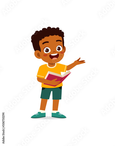 little kid standing and read a book