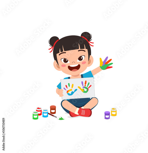 little kid make painting with hand stamp