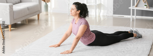 Sporty woman practicing yog...