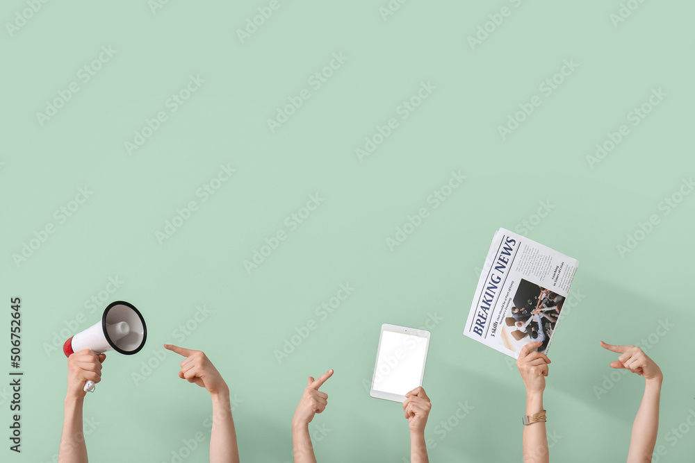 People with newspaper, tablet computer and megaphone on green background - obrazy, fototapety, plakaty 