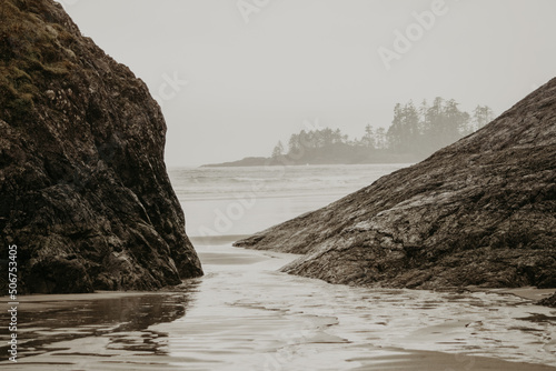 Dark Monochromatic Rocks on Cloudy Tofino Coastline 