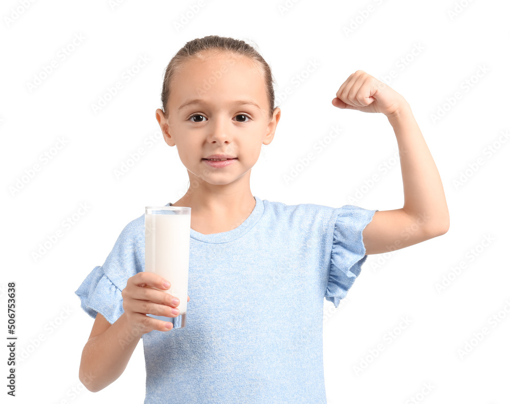 Little girl holding glass of milk and showing muscles on white background Little girl holding glass of milk and showing muscles on white background