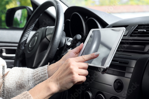 Female driver using tablet computer for navigation © Pixel-Shot
