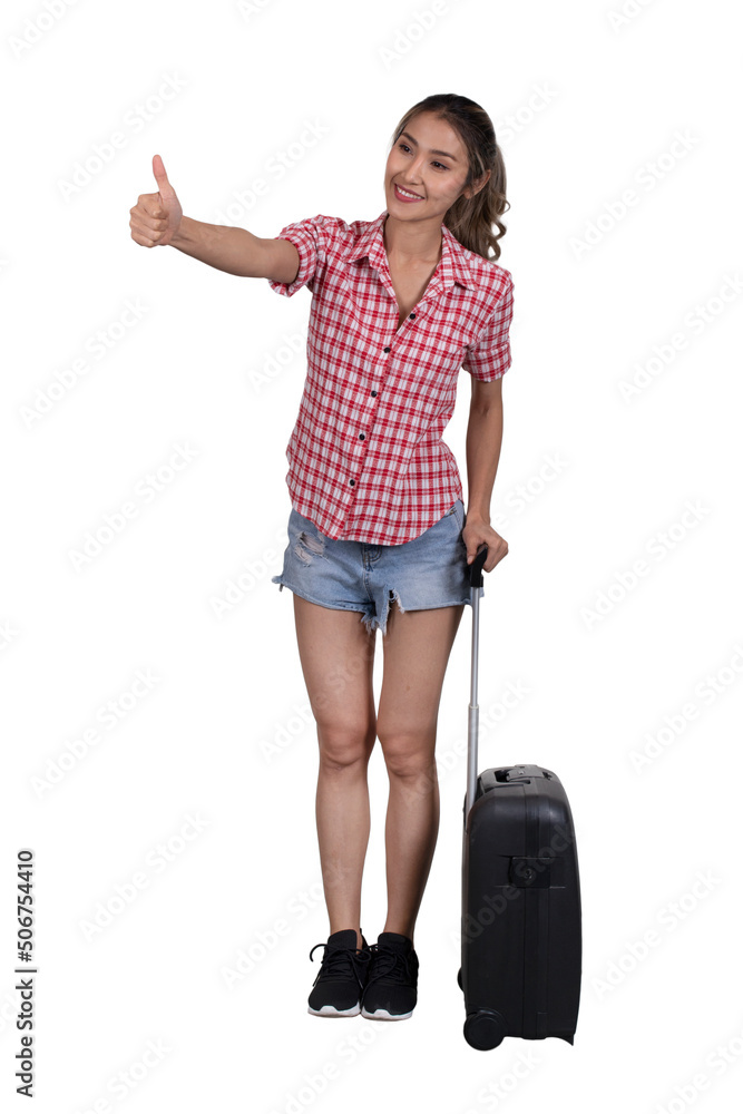 Female tourist standing with luggage showing her thumb up. Female tourist standing with luggage showing her thumb up.