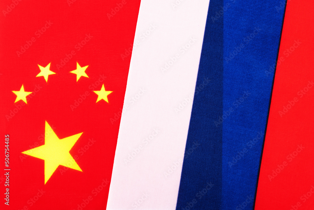 Fototapeta premium Fragments of Russian and Chinese flags