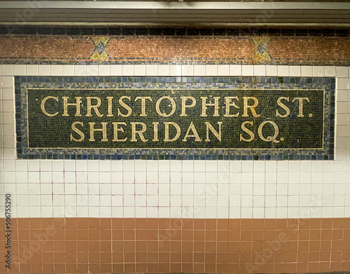 Obraz na płótnie New York, NY - USA - May 20, 2022 The colorful ceramic tile mosaic sign of the Christopher Street–Sheridan Square station, a local station on the IRT Broadway–Seventh Ave Line of the NYC Subway. w salonie