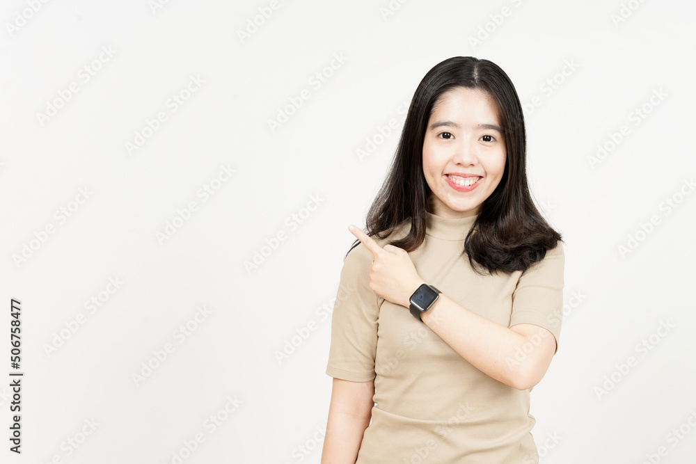 Showing Product and Pointing Side Of Beautiful Asian Woman Isolated On White Background Showing Product and Pointing Side Of Beautiful Asian Woman Isolated On White Background
