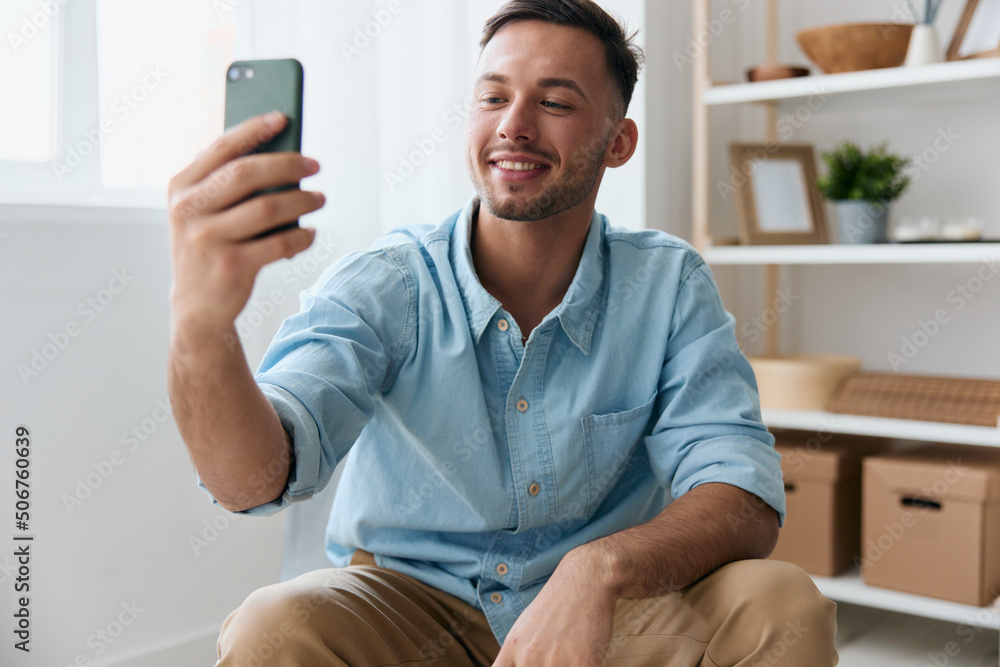 Happy cute joyful talk with friend using phone video call discusses the latest pleasant news raise smiles looks at screen. Distance communication Video conference Gadget concept. Copy space Happy cute joyful talk with friend using phone video call discusses the latest pleasant news raise smiles looks at screen. Distance communication Video conference Gadget concept. Copy space