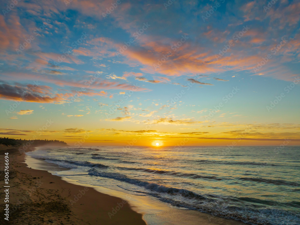 Aerial sunrise seascape with  high cloud