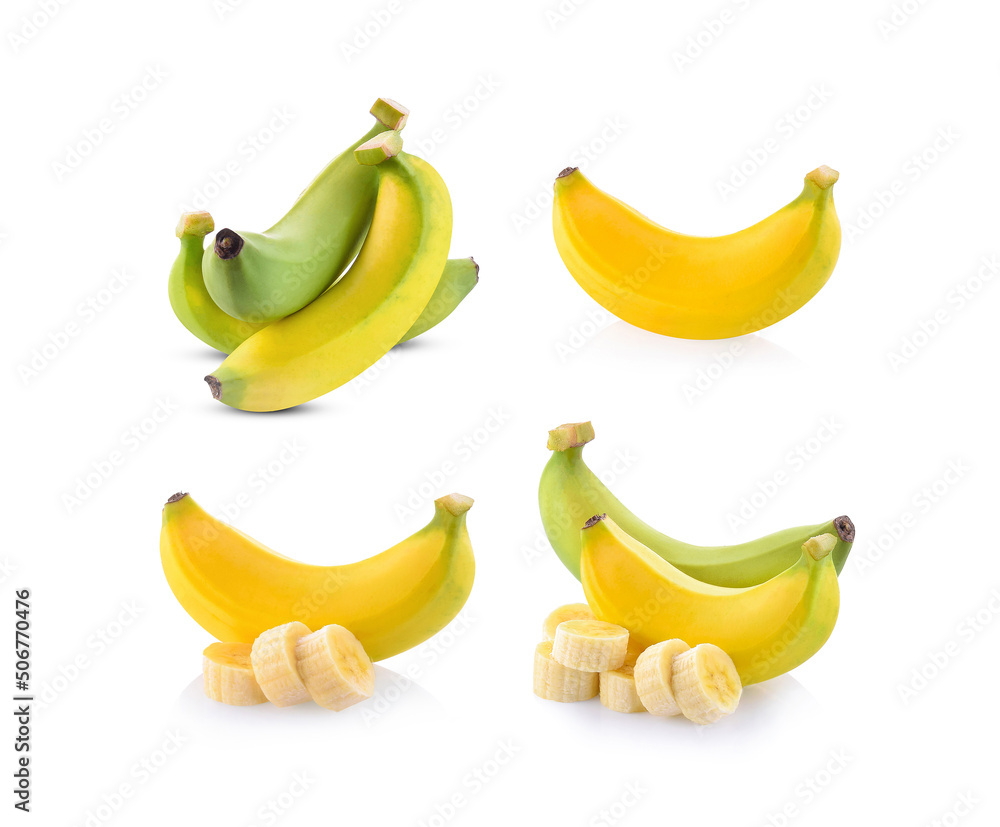 Ripe bananas and sliced bananas on white isolated background.