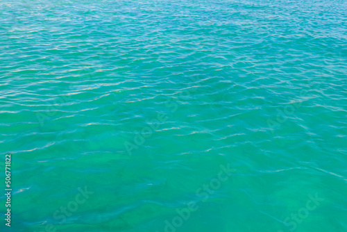 Blue water texture background. Surface of sea or ocean