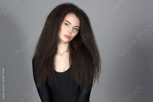 young woman. healthy curly hair beautiful model girl