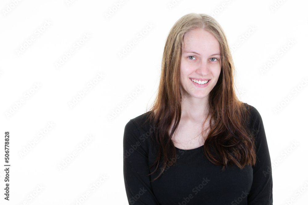 Young cheerful happy woman smiling laughing looking at camera over white background aside copy space Young cheerful happy woman smiling laughing looking at camera over white background aside copy space