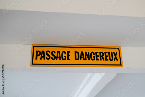Passage dangereux french text means dangerous passage in up yellow panel board