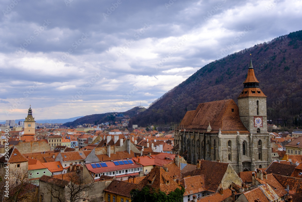 Viewpoint of the colorful bright roofs of the houses in the city of Brasov, Romania