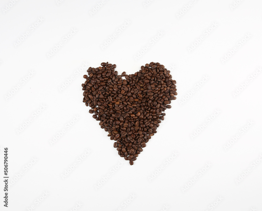 heart made of coffee beans on a white background heart made of coffee beans on a white background