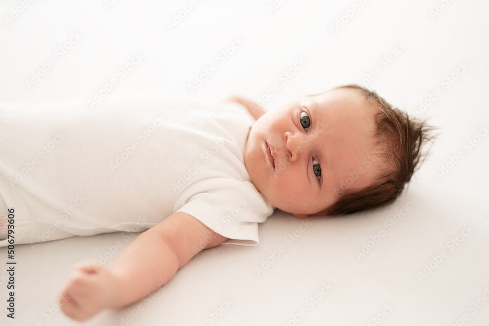 one week old cute newborn infant baby boy expressions tiny feet details one week old cute newborn infant baby boy expressions tiny feet details
