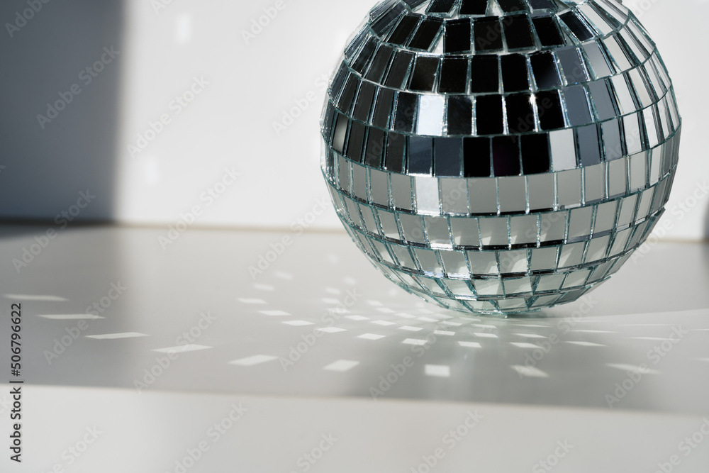 Disco ball in sunlight on white background Stock Photo Adobe Stock