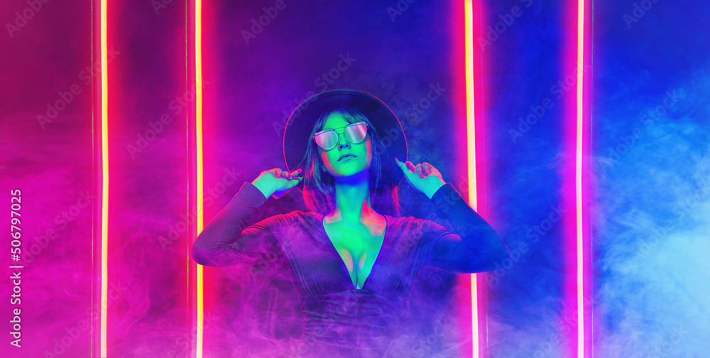 Neon close up portrait of young woman in red sunglasses. 80`s disco style.