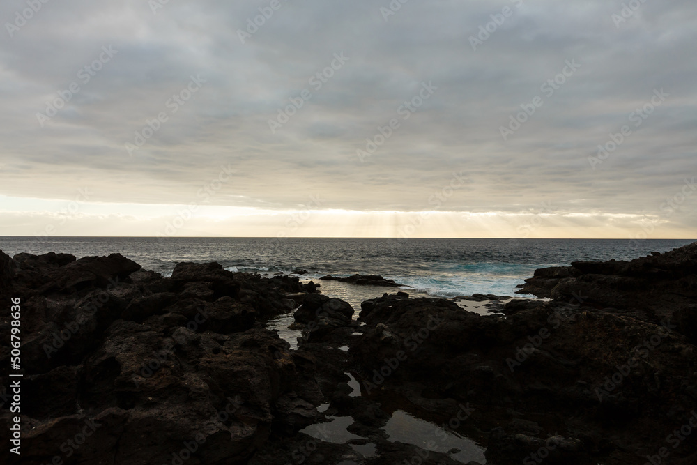Calm ocean in the morning. ocean shore with stones