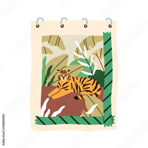 Sketchbook with picture of tiger animal in nature. Spiral notebook with drawi...