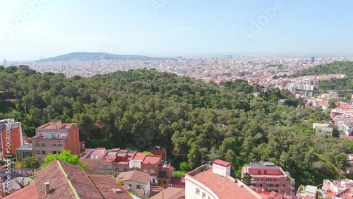 Barcelona, Spain: Aerial view of capital city of Catalonia, sunny day in Park Güell - landscape panorama of Europe from above