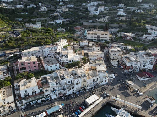 Aerial view of Marina Grande in Capri, an island located in the Tyrrhenian Sea off the Sorrento Peninsula, on the south side of the Gulf of Naples in the Campania region of Italy. Drone view of Capri.