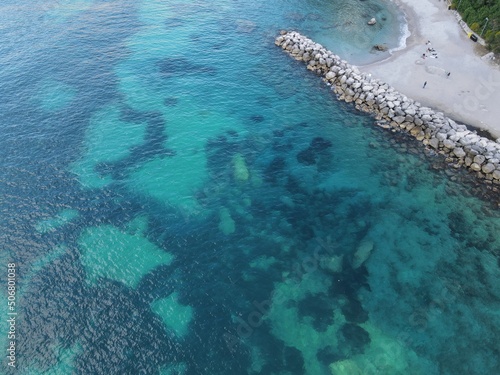 Aerial view of Marina Grande in Capri  an island located in the Tyrrhenian Sea off the Sorrento Peninsula  on the south side of the Gulf of Naples in the Campania region of Italy. Drone view of Capri.