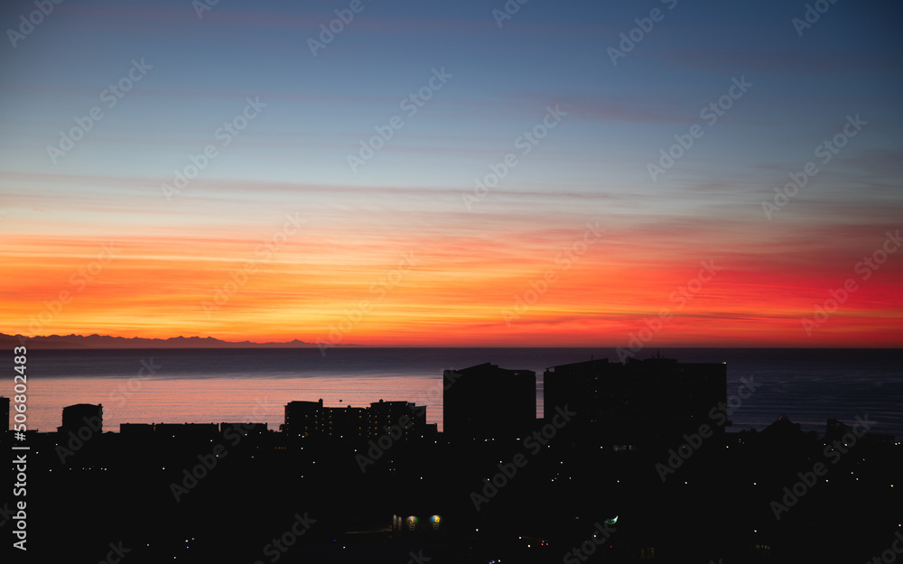 Sunrise over coastal town, Mossel Bay
