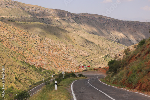 Road through the Red canyon leading to Noravank, Armenia