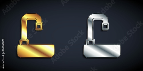Gold and silver Washbasin with water tap icon isolated on black background. Long shadow style. Vector