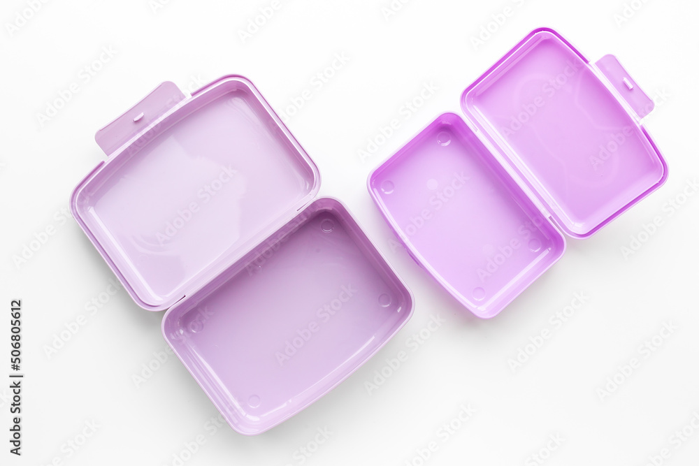 Empty purple lunch boxes, top view. Plastic container for food Empty purple lunch boxes, top view. Plastic container for food
