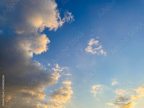 Sunset sky with fluffy clouds, morning or down time of day. © troyanphoto