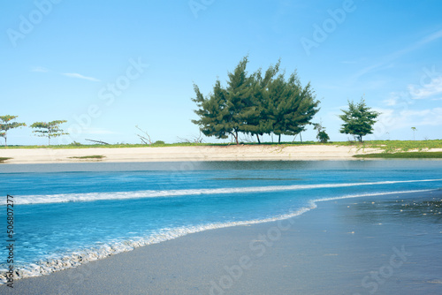 Fototapeta Naklejka Na Ścianę i Meble -  Sandy beach with the blue ocean