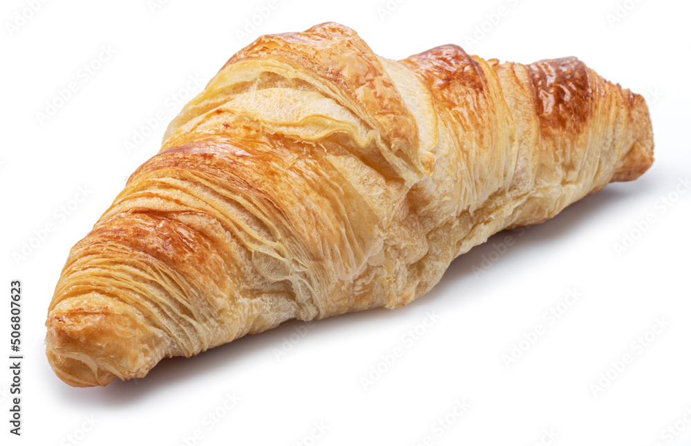 Tasty crusty croissant close-up on a white background. Tasty crusty croissant close-up on a white background.
