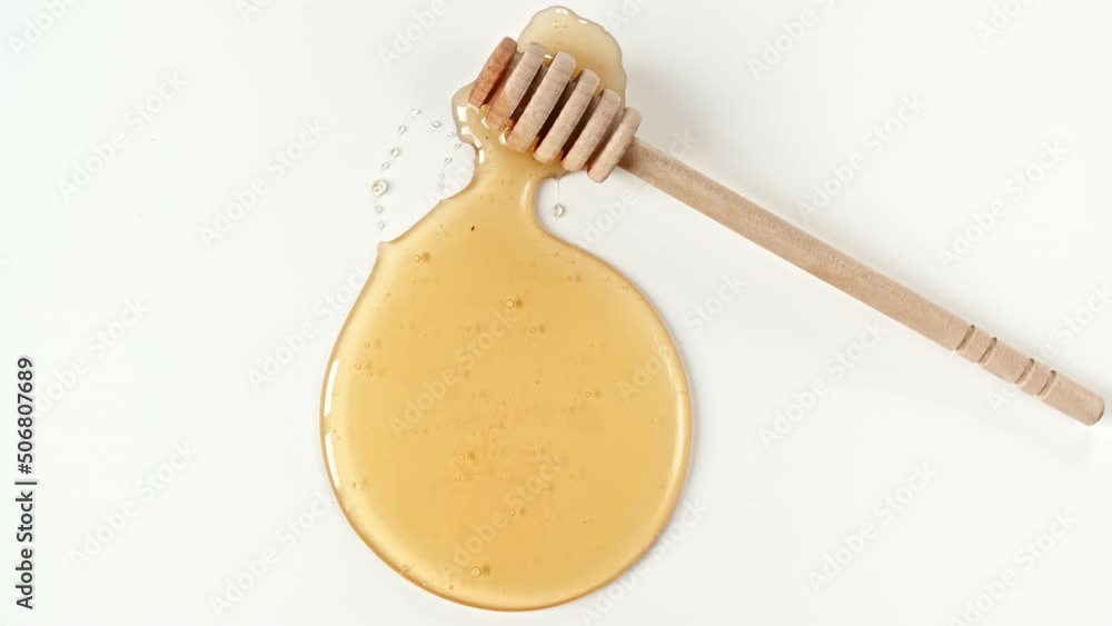 Rotation of the Composition with Fresh Honey on a White Background, top view. Healthy Food Concept. High quality 4k footage Rotation of the Composition with Fresh Honey on a White Background, top view. Healthy Food Concept. High quality 4k footage