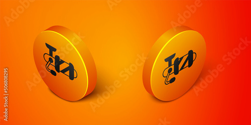 Isometric Spinning reel for fishing icon isolated on orange background. Fishing coil. Fishing tackle. Orange circle button. Vector © Iryna