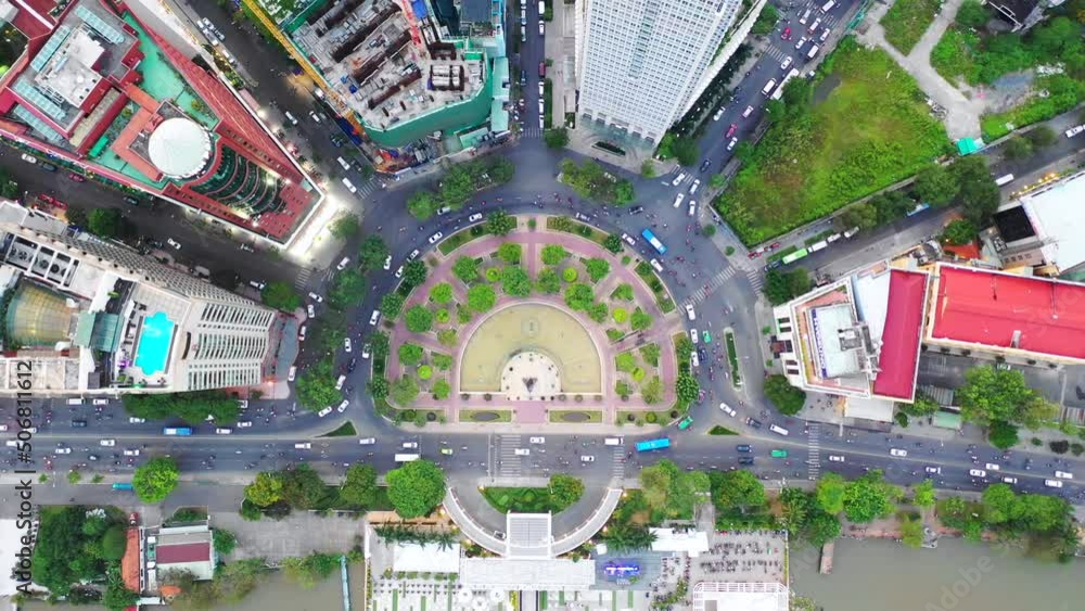 Time lapse Aerial city view, flying over a city, a suggestive perpendicular aerial video above a traffic roundabout with a lot of traffic, Vietnam Ho chi minh city. Timelapse
Time lapse Aerial city view, flying over a city, a suggestive perpendicular aerial video above a traffic roundabout with a lot of traffic, Vietnam Ho chi minh city. Timelapse