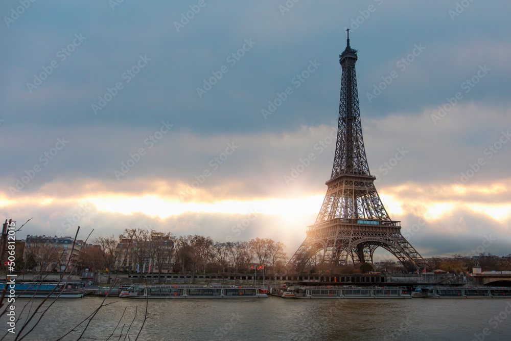 Fototapeta premium Paris Eiffel Tower and river Seine in Paris, France. Eiffel Tower is one of the most iconic landmarks of Paris