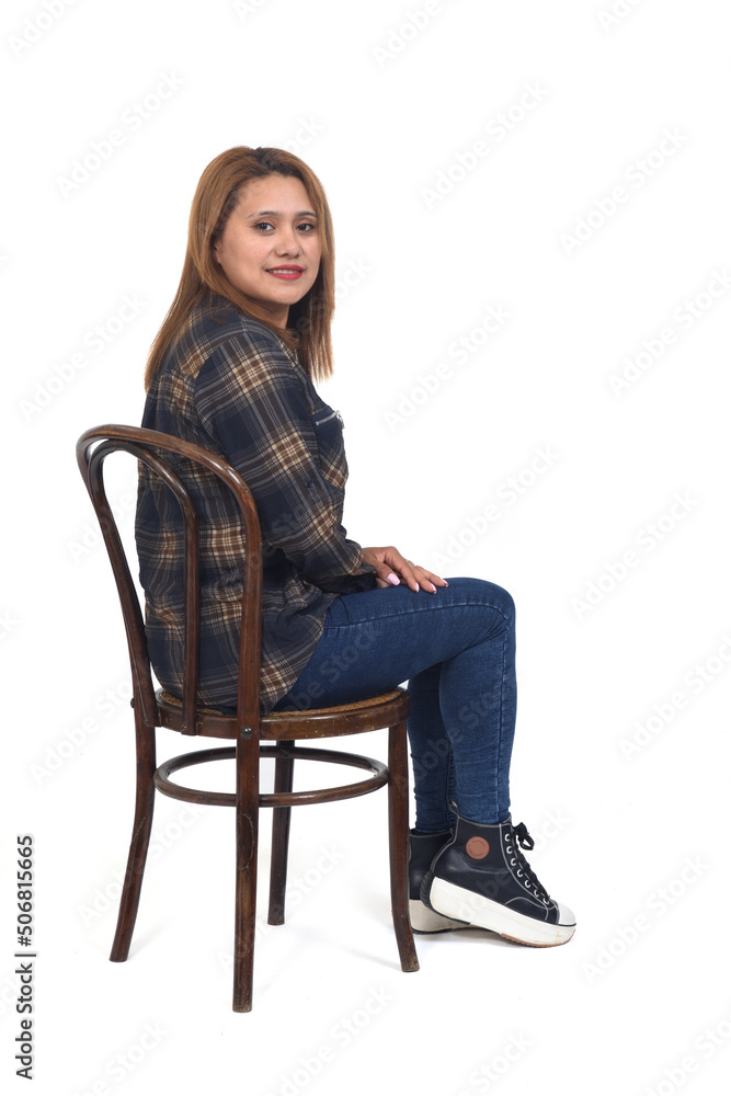 woman sitting on chair turnned on white background woman sitting on chair turnned on white background