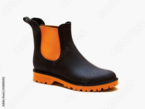 Bilde på lerret Women's fashion rubber boot on a white background